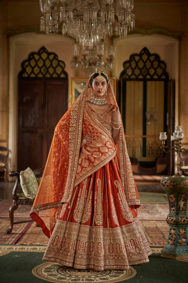 Rust Orange Silk Bridal Lehenga Choli with Heavy Zari Work & Dual Dupatta Style