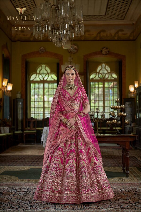 Majestic Rani Pink Bridal Lehenga Choli with Dual Dupatta Style and Intricate Gold Zari Embroidery