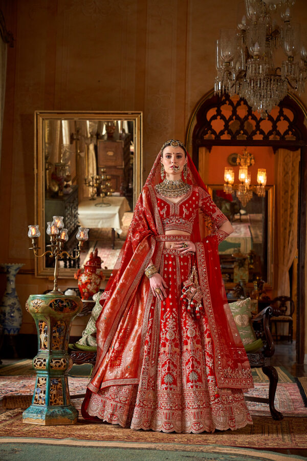 Signature Red Silk Bridal Lehenga Choli with Scalloped Borders and Heritage Motifs